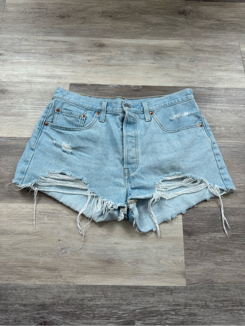 Levi's 501 high-rise denim cut-off shorts w/ button fly and distressed hem